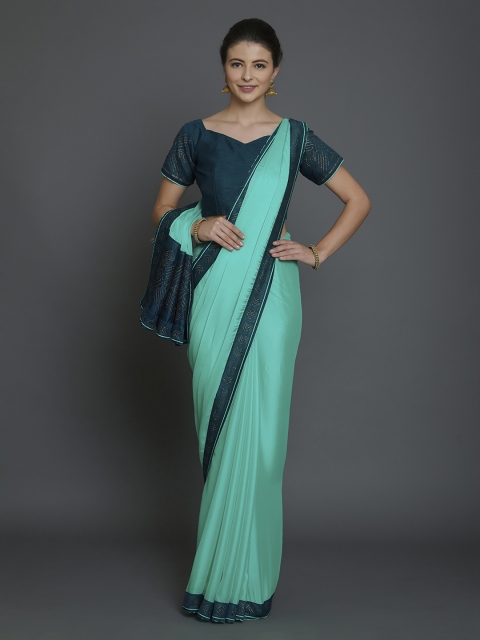 

Mitera Sea Green & Teal Poly Georgette Solid Saree