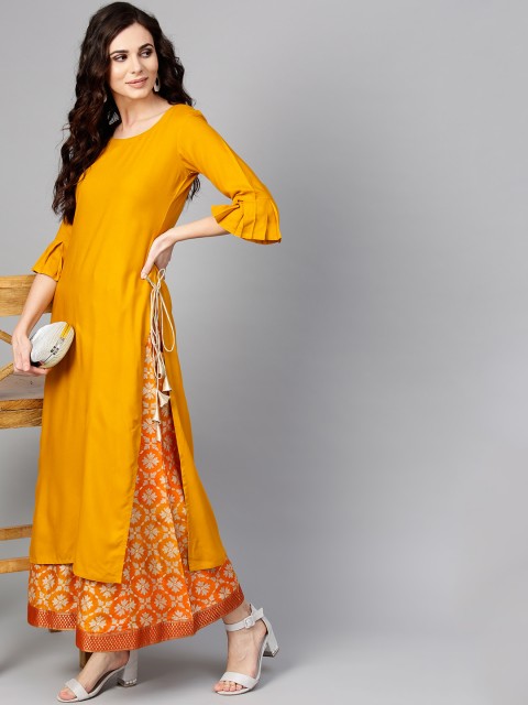 

Libas Women Mustard Yellow & Orange Solid Kurta with Printed Palazzos