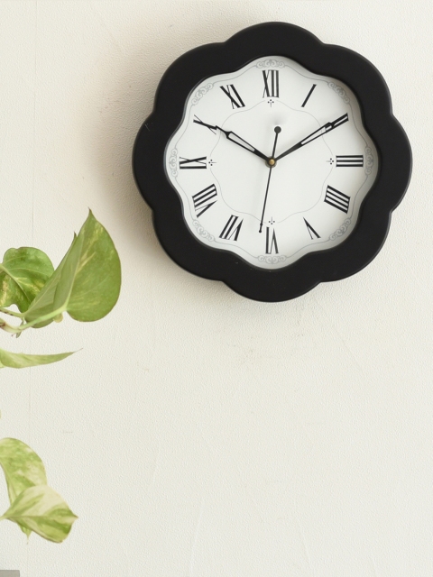 

eCraftIndia White & Black Handcrafted Round Solid Analogue Wall Clock