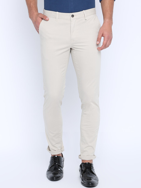 

Basics Men Off-White Tapered Fit Solid Chinos