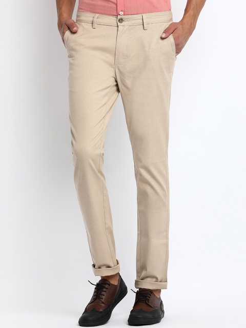 

Basics Men Beige Tapered Fit Self Design Chinos
