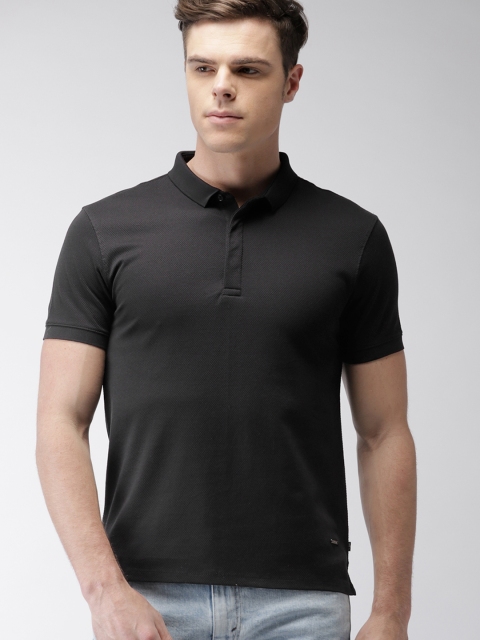 

Levis Men Black Solid Polo T-shirt