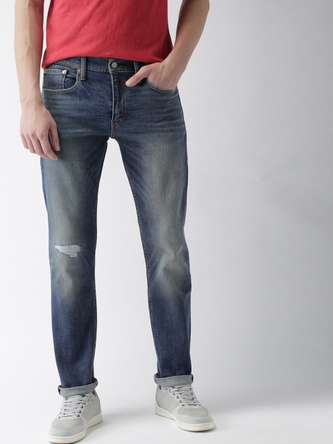 

Levis Men Blue Tapered Fit Low-Rise Low Distress Stretchable 502 Jeans
