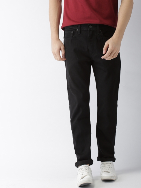 

Levis Men Black Regular Tapered Fit Mid-Rise Clean Look Jeans 502