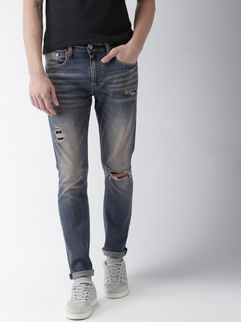 

Levis Men Blue Tapered Fit Low-Rise Mildly Distressed Stretchable Jeans 512