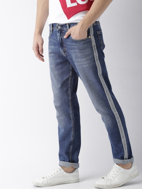 

Levis Men Blue Regular Tapered Fit Mid-Rise Clean Look Stretchable Jeans 502