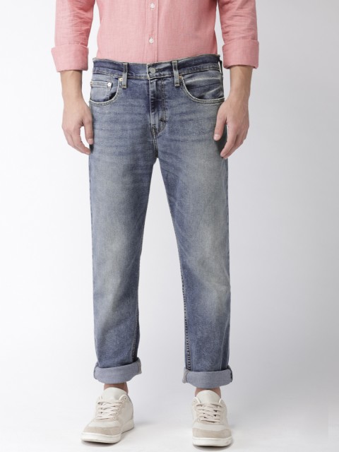 

Levis Men Blue Regular Tapered Fit Mid-Rise Clean Look Stretchable Jeans 502