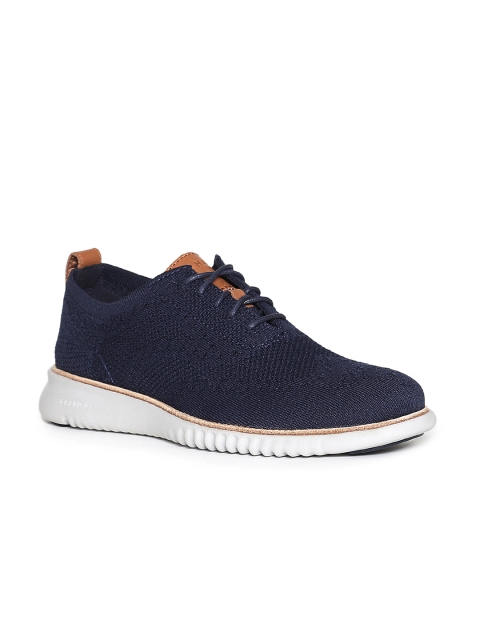 

Cole Haan Men Navy Blue Sneakers