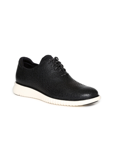 

Cole Haan Men Black Leather Sneakers