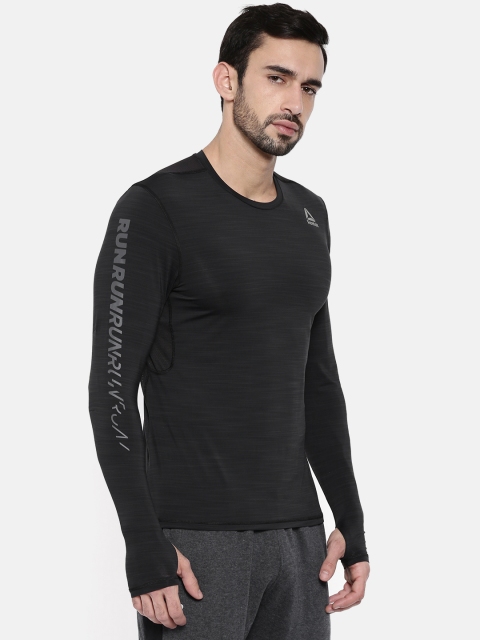 

Reebok Men Black Solid LS AC Round Neck T-shirt