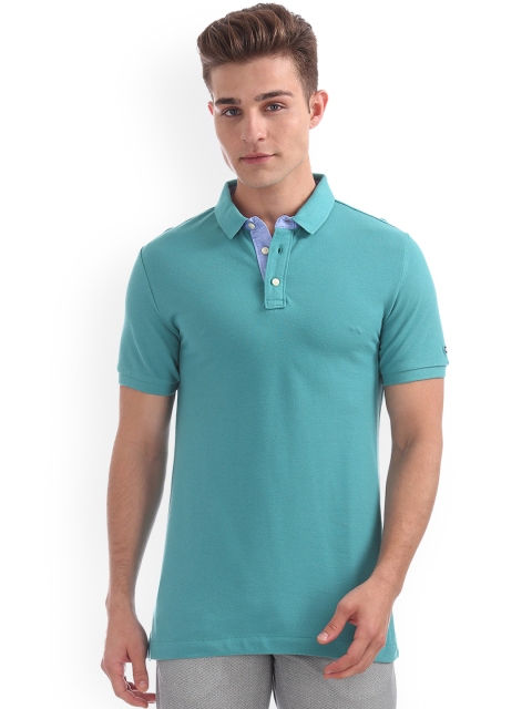 

Arrow Sport Men Green Solid Polo Collar T-shirt