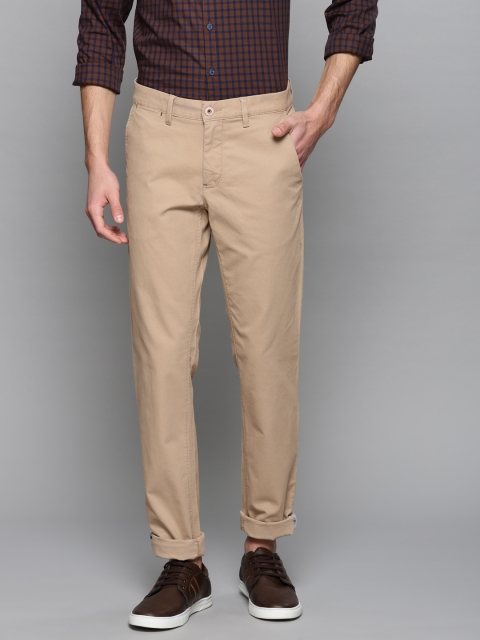 

Louis Philippe Sport Men Beige Slim Fit Solid Regular Trousers