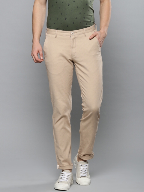 

Louis Philippe Sport Men Beige Slim Fit Solid Regular Trousers