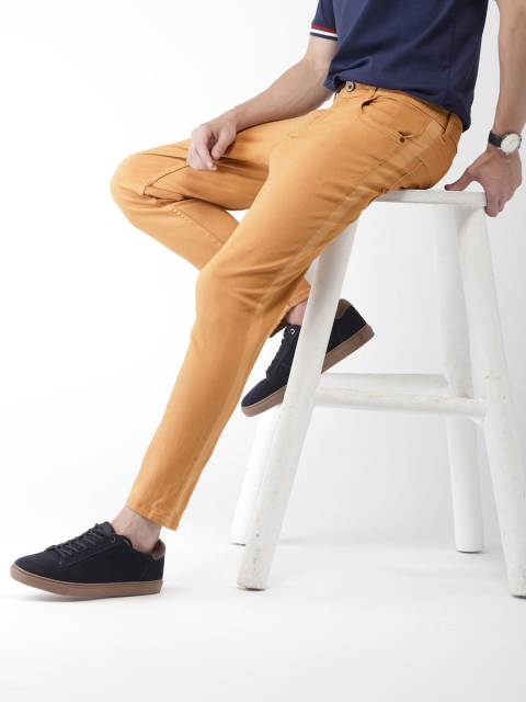 

Mast & Harbour Men Khaki Brown Carrot Regular Fit Mid-Rise Clean Look Stretchable Jeans