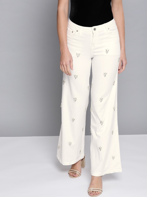 

Chemistry Women Off-White Flared Mid-Rise Embellished Clean Look Jeans