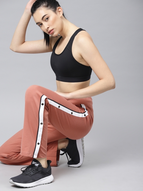 

HRX by Hrithik Roshan Women Peach-Coloured Solid Lifestyle Snap Slit Track Pants