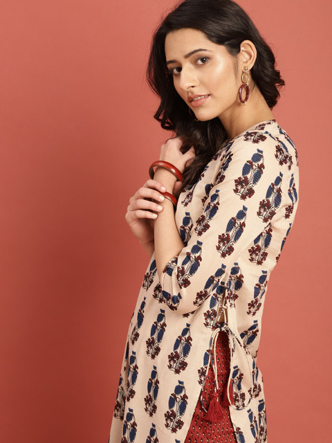 

Taavi Women Beige & Maroon Block Print Legacy Kurta Set with High Slits and Tie-ups