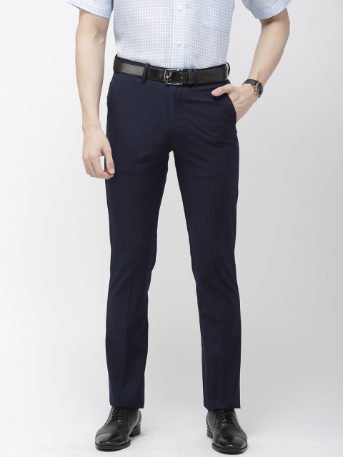 

Arrow Men Navy Blue Tapered Fit Self Design Formal Trousers