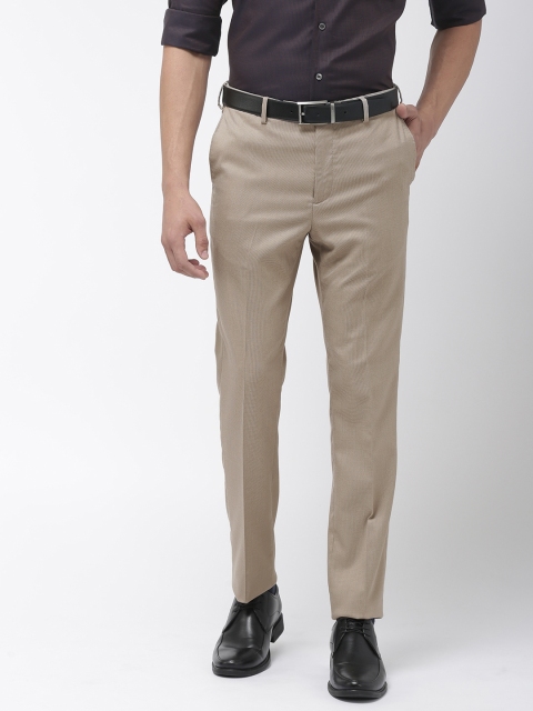 

Arrow Men Beige Tapered Fit Self Design Regular Trousers