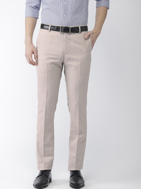 

Arrow Men Beige Tapered Fit Self Design Formal Trousers