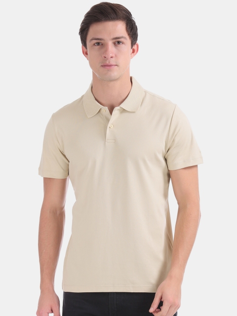 

Arrow Men Beige Solid Polo Collar T-shirt