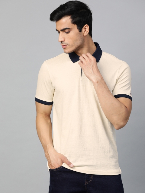 

Arrow Sport Men Cream-Coloured Self Striped Polo Collar T-shirt