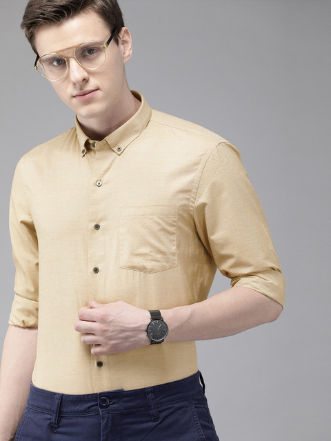 

Arrow New York Men Beige Slim Fit Solid Smart Casual Shirt