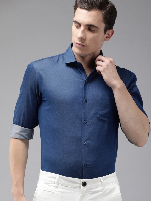 

Arrow New York Men Blue Snug Regular Fit Solid Smart Casual Shirt