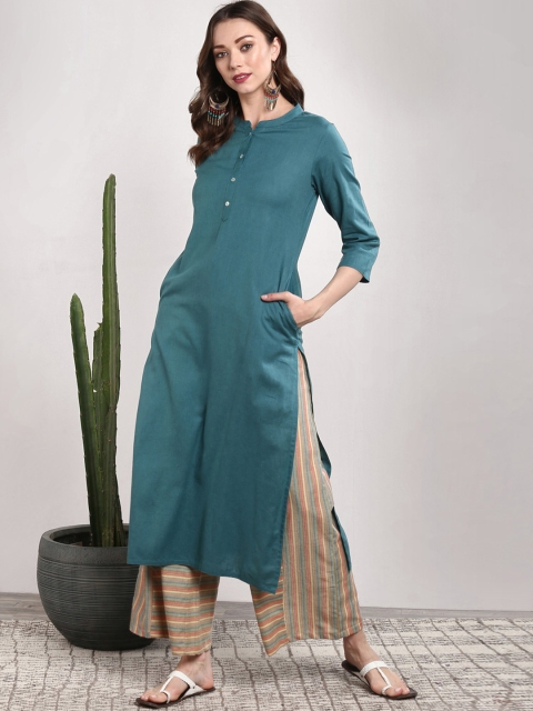 

Sangria Women Turquoise Blue Printed Kurta with Palazzos