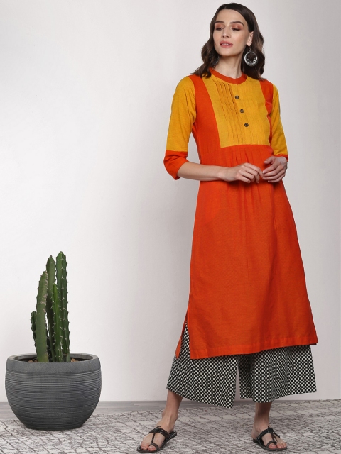 

Sangria Red & Black Kurta with Pintucks Detail & Teamed Up with Printed Pants