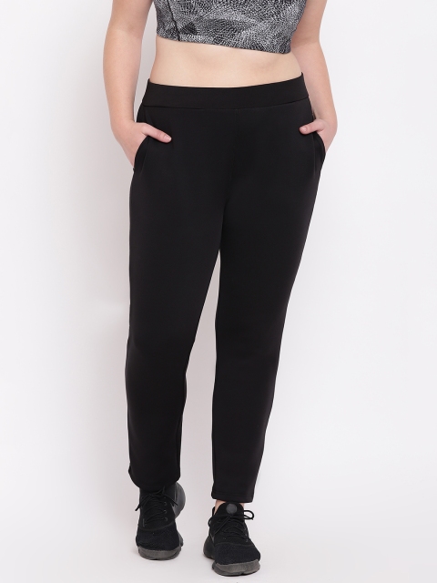 

The Pink Moon Plus Size Women Black Solid Track Pants