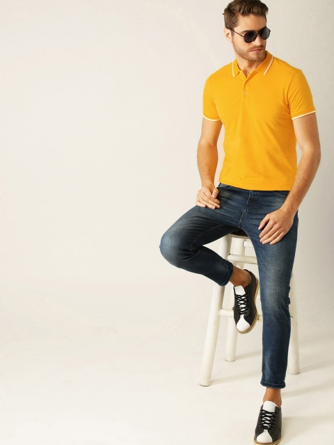 

United Colors of Benetton Men Yellow Solid Polo Collar T-shirt