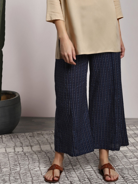 

Sangria Women Navy Blue Regular Fit Printed Parallel Trousers