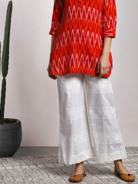 

Sangria Women White Printed Cotton Paneled Palazzo With Pockets