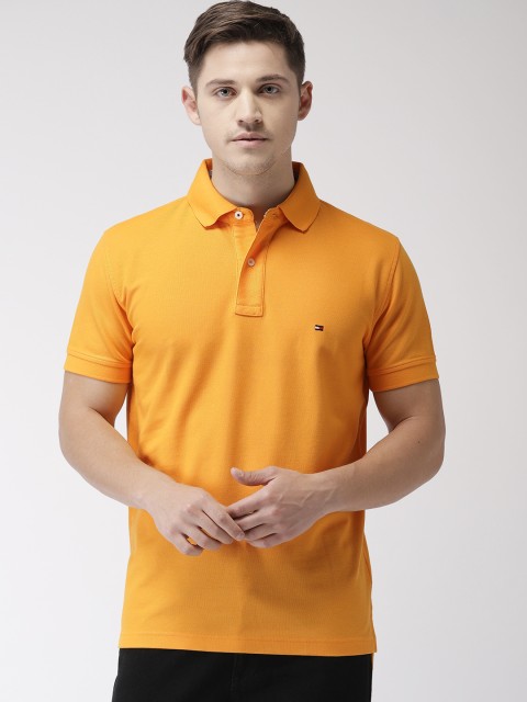 

Tommy Hilfiger Men Mustard Solid Polo Collar T-shirt