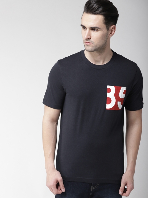 

Tommy Hilfiger Men Navy Blue Solid Round Neck T-shirt