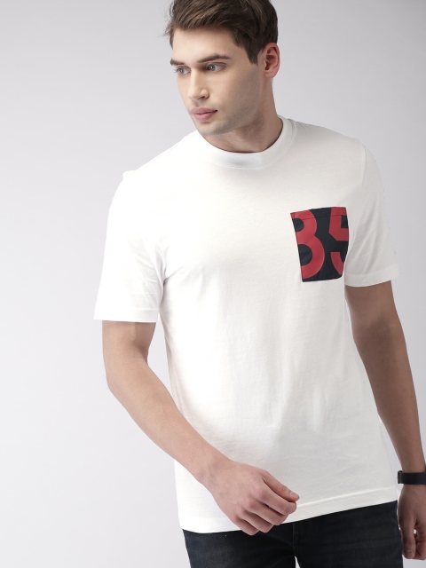 

Tommy Hilfiger Men White Solid Round Neck T-shirt with Pocket Detailing