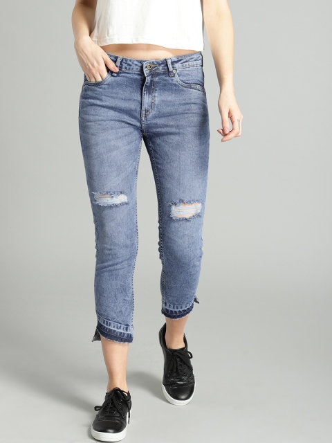 

Roadster Women Blue Slashed Knee Step Hem Crop Skinny Fit Mid-Rise Stretchable Jeans