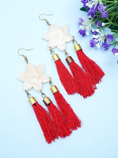 

Golden Peacock Resin Star Shaped Red Earring