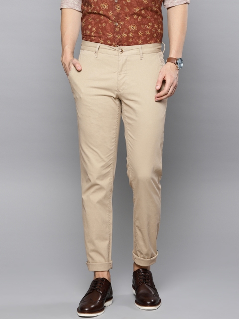 

Louis Philippe Sport Men Beige Slim Fit Solid Regular Trousers