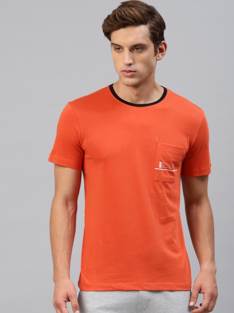 

HRX by Hrithik Roshan Men Orange Solid Round Neck T-shirt