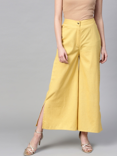 

SASSAFRAS Women Mustard Yellow Flared Solid Parallel Trousers