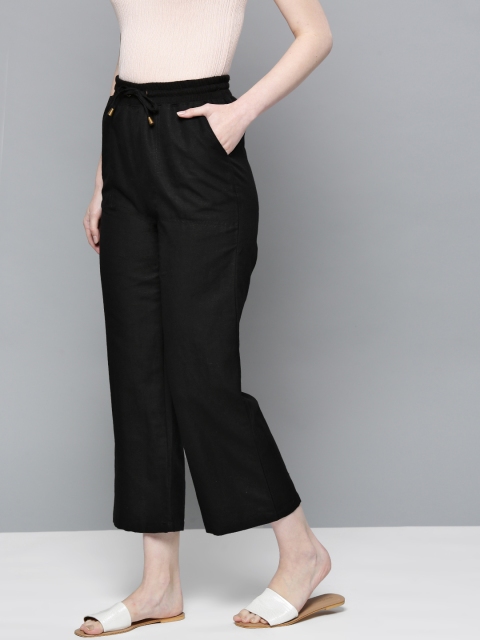 

Chemistry Women Black Solid Parallel Trousers