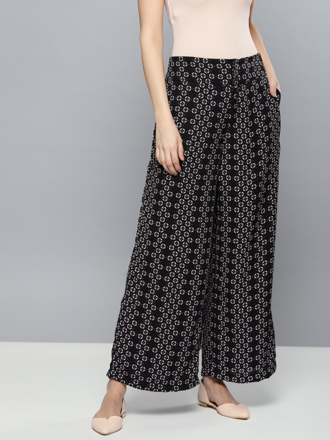 

Chemistry Women Black & White Regular Fit Printed Parallel Trousers