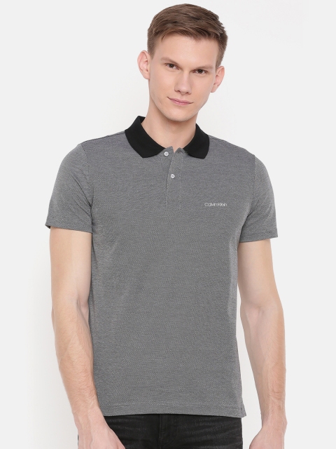 

Calvin Klein Jeans Men Black Self Design Polo Collar T-shirt
