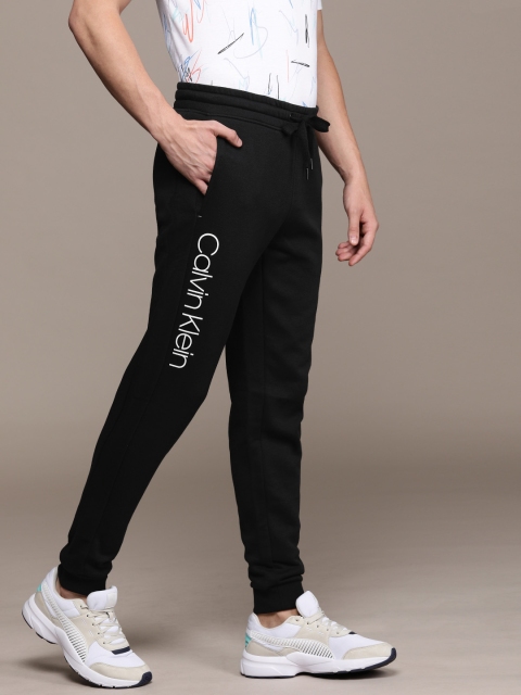 

Calvin Klein Jeans Men Black Straight Fit Solid Joggers with Printed Detail