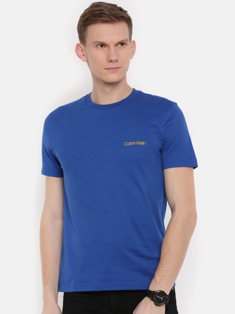 

Calvin Klein Jeans Men Blue Solid Round Neck T-shirt