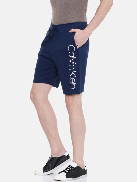 

Calvin Klein Jeans Men Navy Solid Regular Fit Regular Shorts, Navy blue