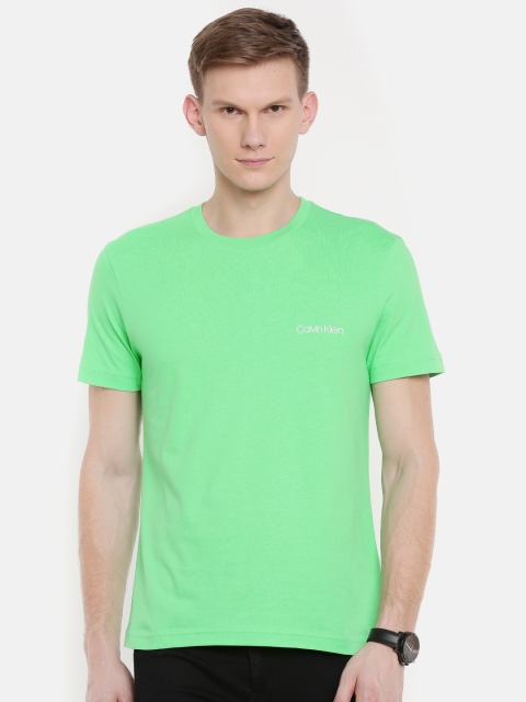 

Calvin Klein Jeans Men Green Solid Round Neck T-shirt