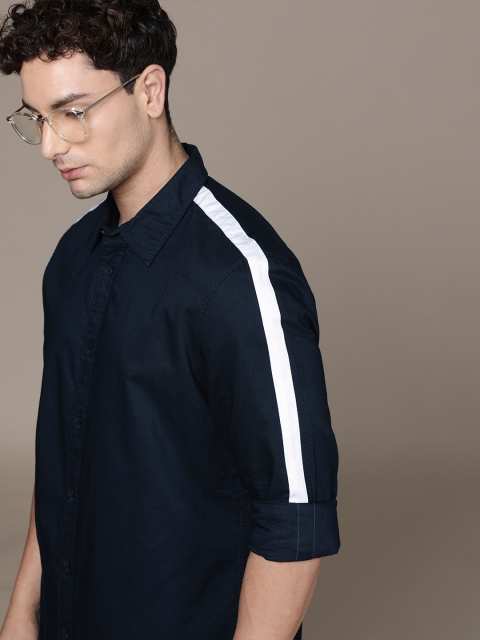 

Calvin Klein Jeans Men Navy Blue Solid Casual Shirt with Shoulder Stripe